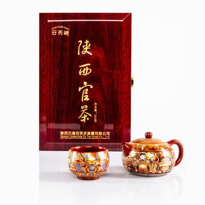 Granelli di tè scuro compressi a forma quadrata con disegno compresso provenienti da Shaanxi